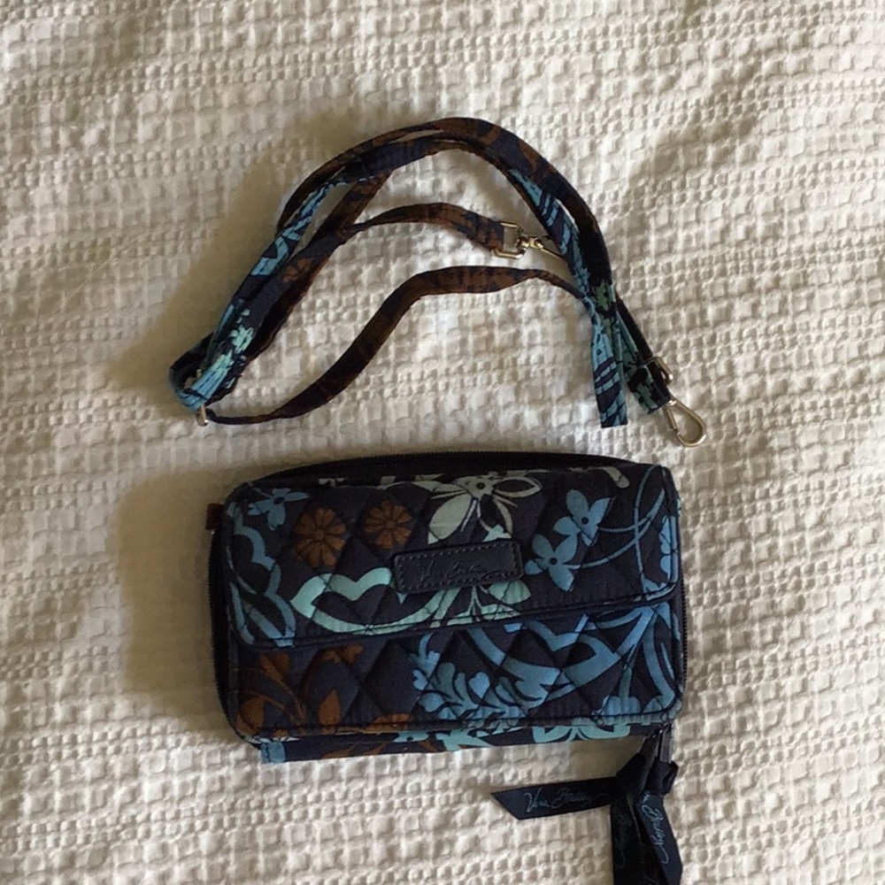 Vera Bradley clutch purse with detachable strap.